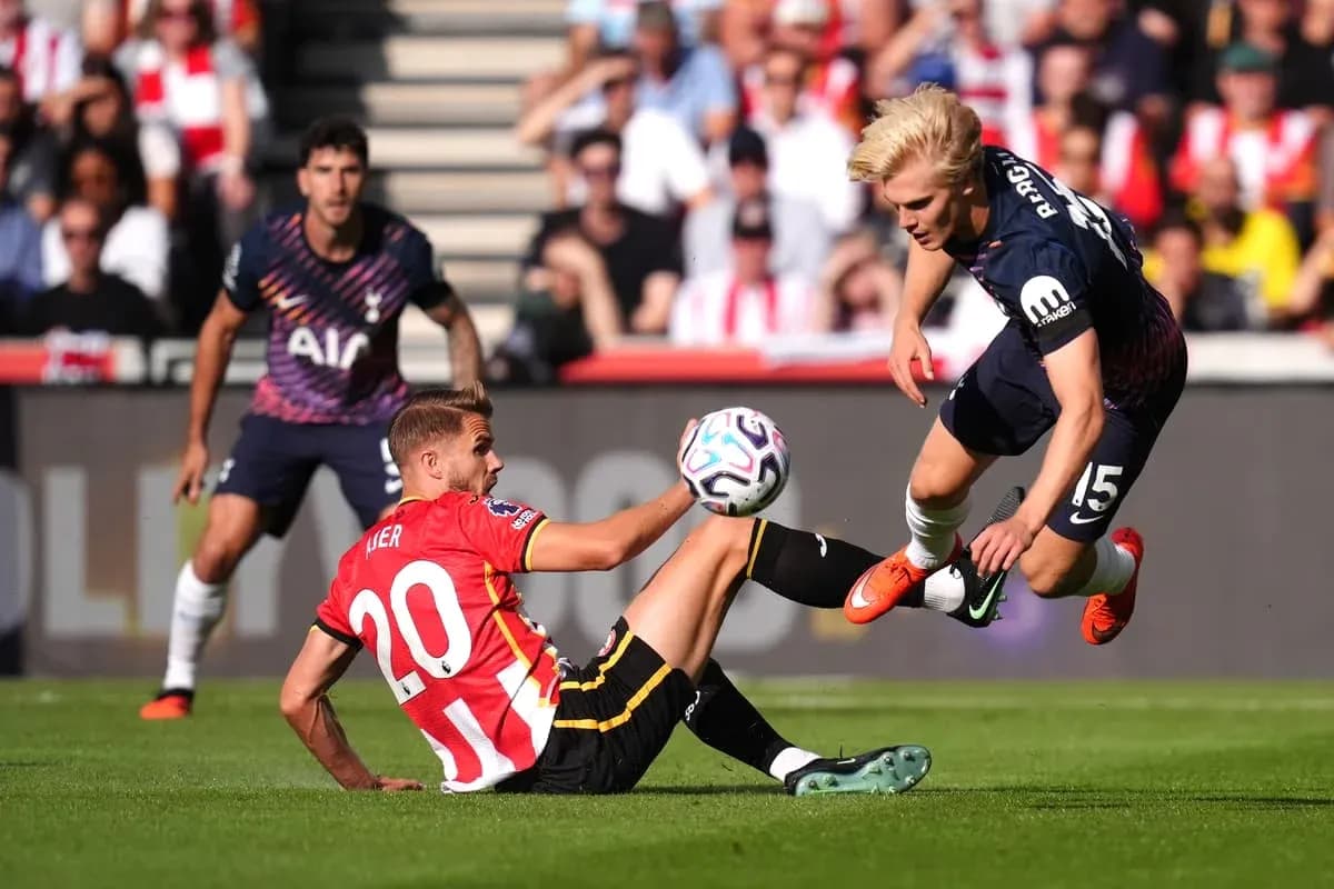 Player tackles opponent while ball is in play Player tackles opponent while ball is in play