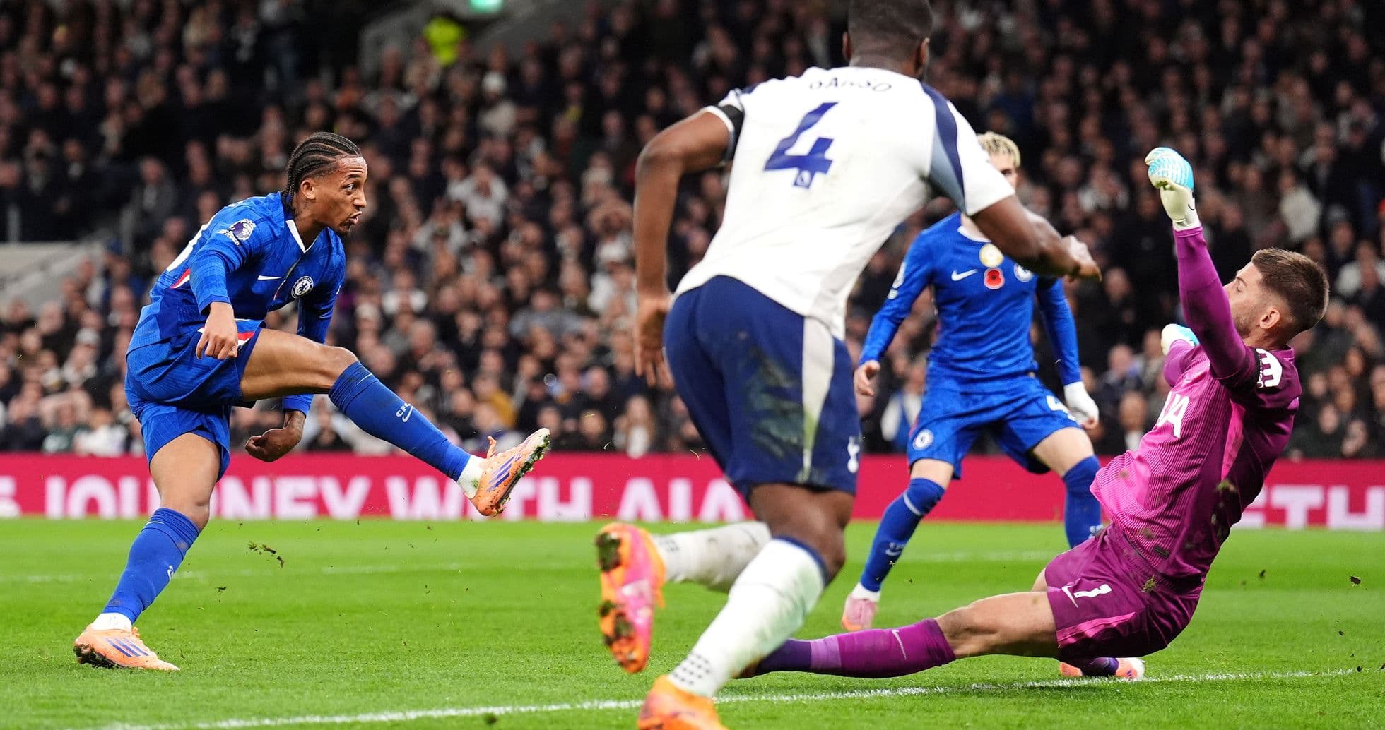 Chelsea player attempting a shot on goal