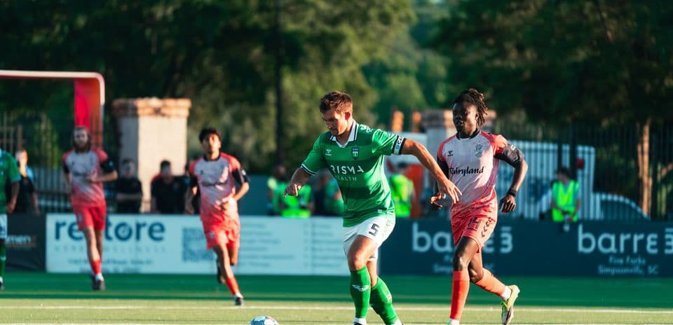 Player dribbling the ball during match