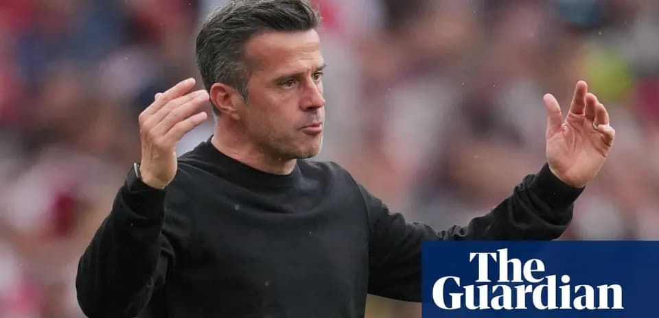 Manager gesturing during match from sideline