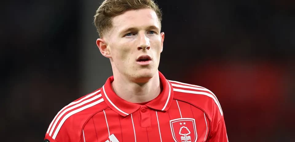 Player wearing red Nottingham Forest jersey on field