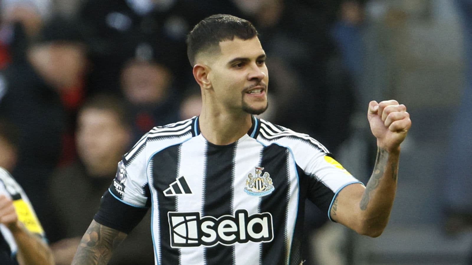 Newcastle player celebrating a goal