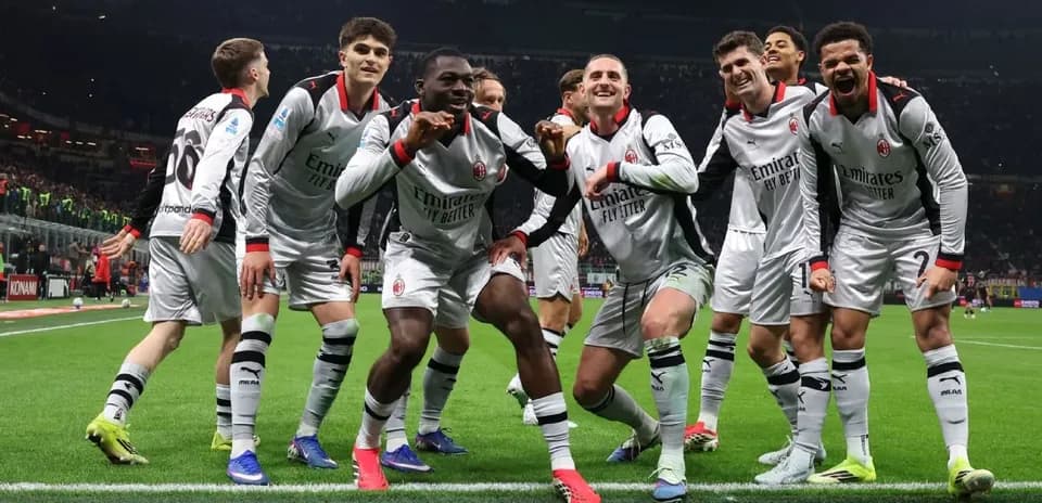 AC Milan players celebrating a goal during match