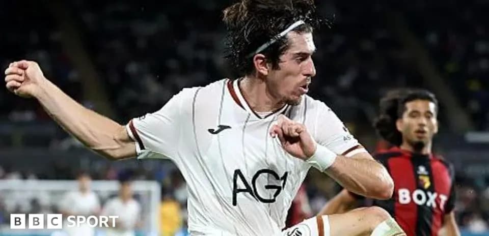 Player kicking the ball during a football match