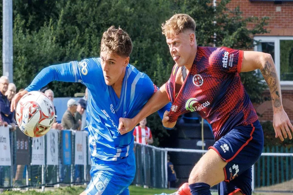 Two players competing for the ball during a match