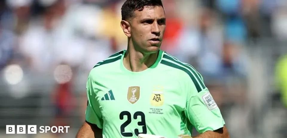 Goalkeeper in green kit during a match
