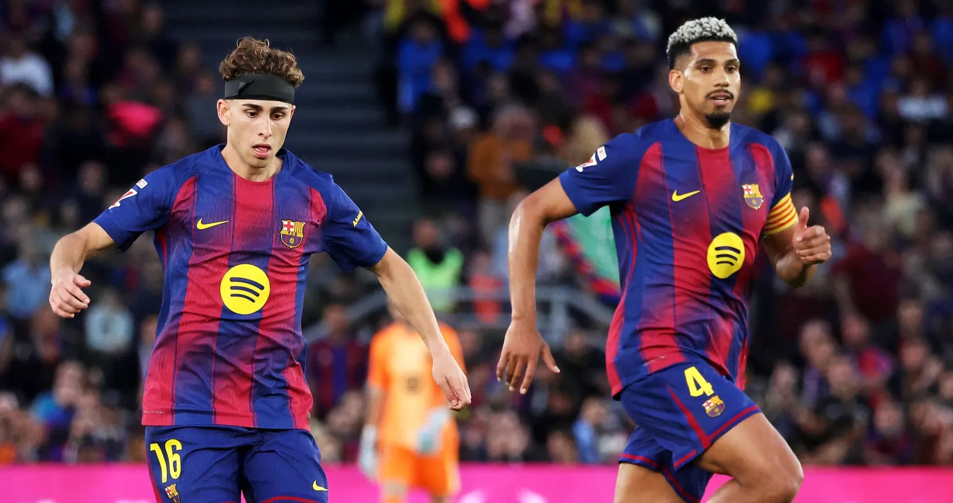 Two FC Barcelona players during a match