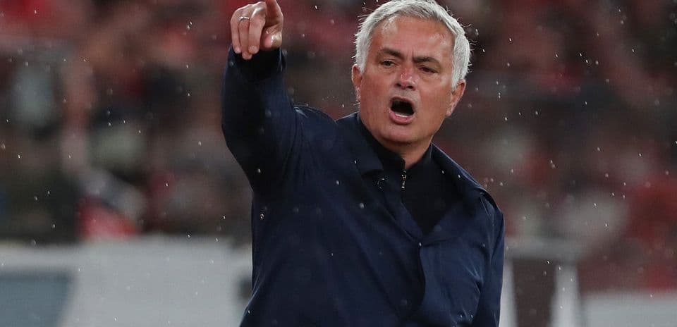 Manager directing players during a match
