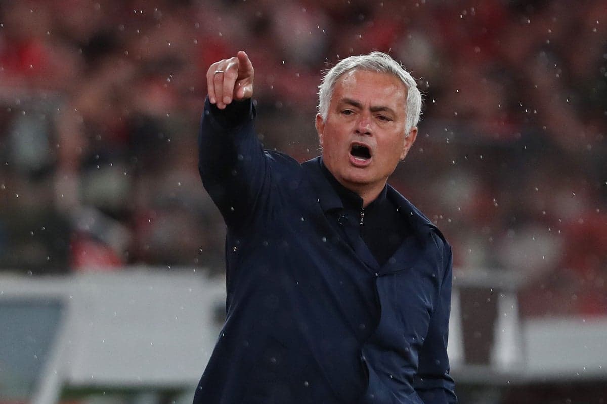Manager directing players during a match
