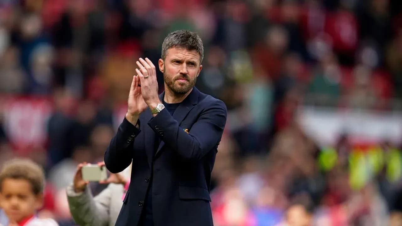 Coach applauding the crowd after the match