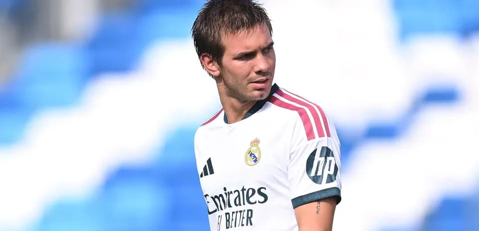 Football player in Real Madrid jersey on field