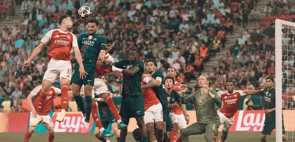 Players contesting a high ball during match action
