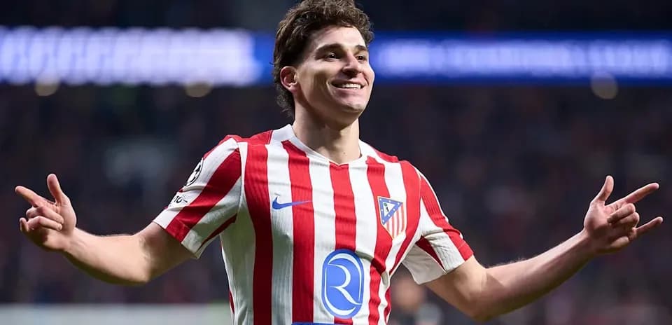 Player celebrating after scoring a goal for Atlético Madrid