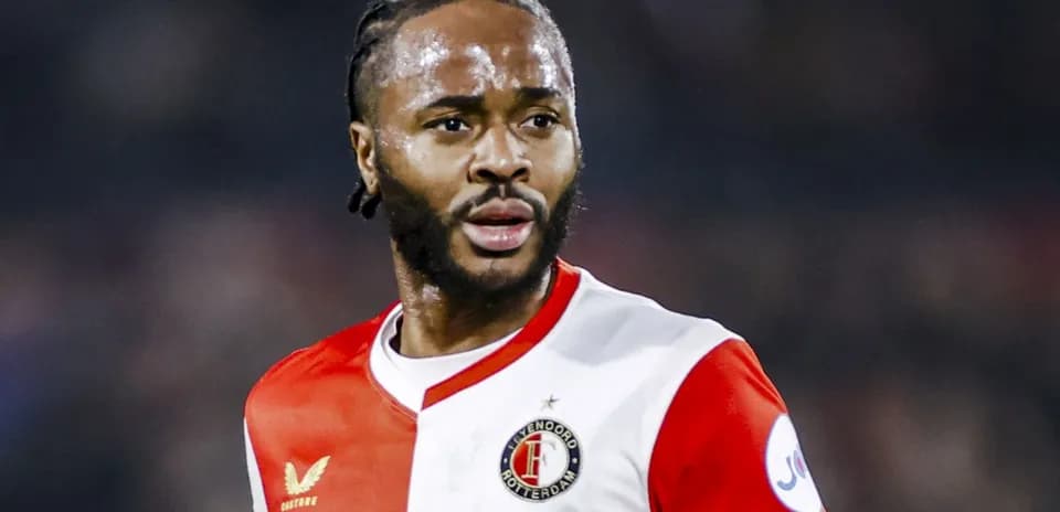 Player in Feyenoord kit during match action