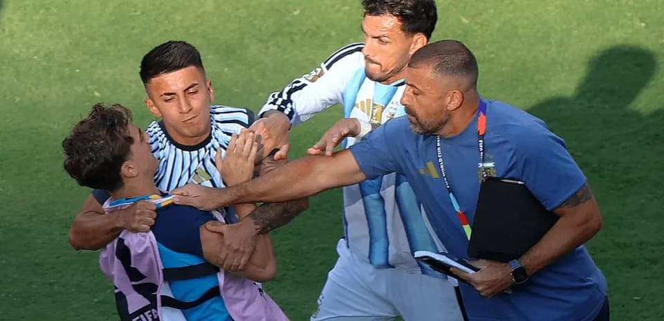 Players and staff involved in a scuffle on field