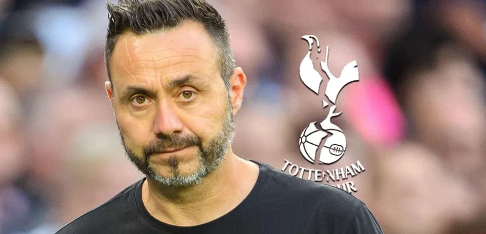 Manager during match with Tottenham Hotspur logo