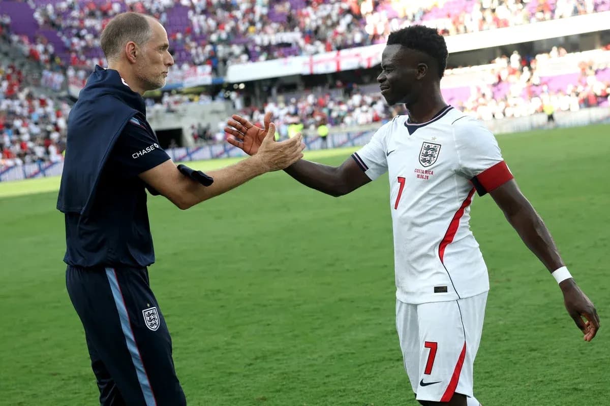 Coach and player shaking hands after the match