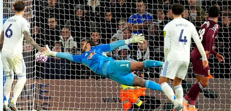 Goalkeeper diving to save a penalty kick