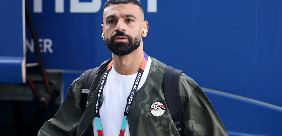 Player arriving at venue wearing team gear