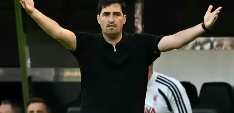 Coach gesturing during match from the sidelines