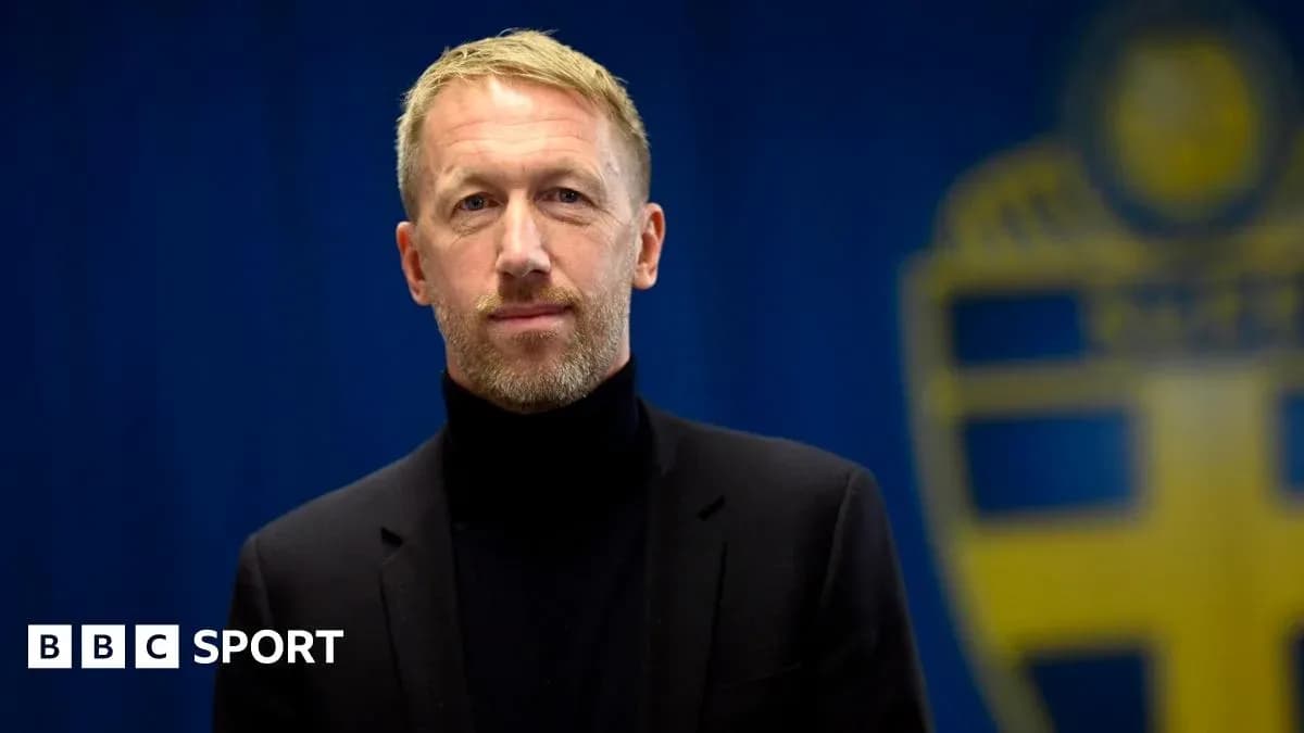 Man in black suit against blue background