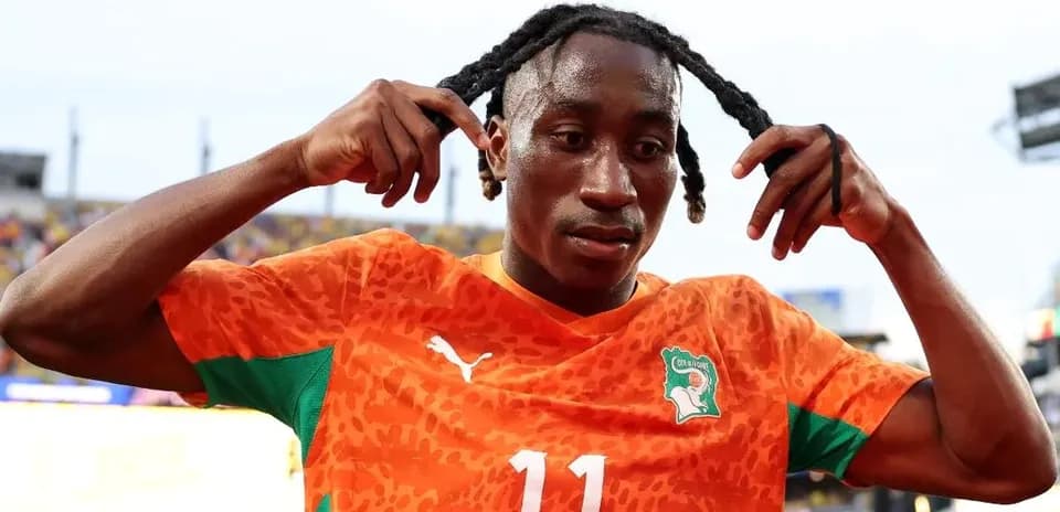 Player adjusting his hair after match