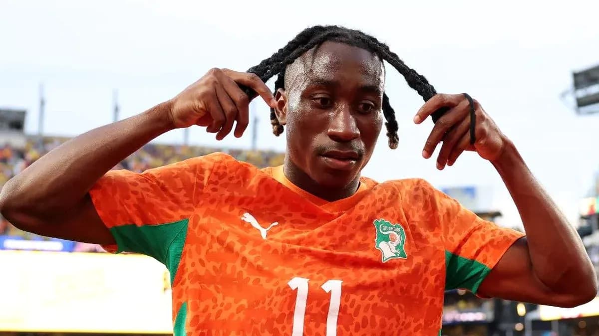 Player adjusting his hair after match