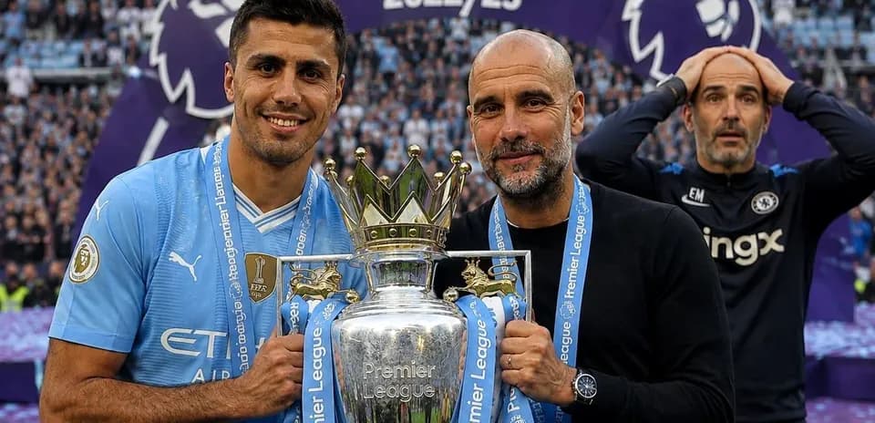 Player and manager celebrating Premier League trophy win