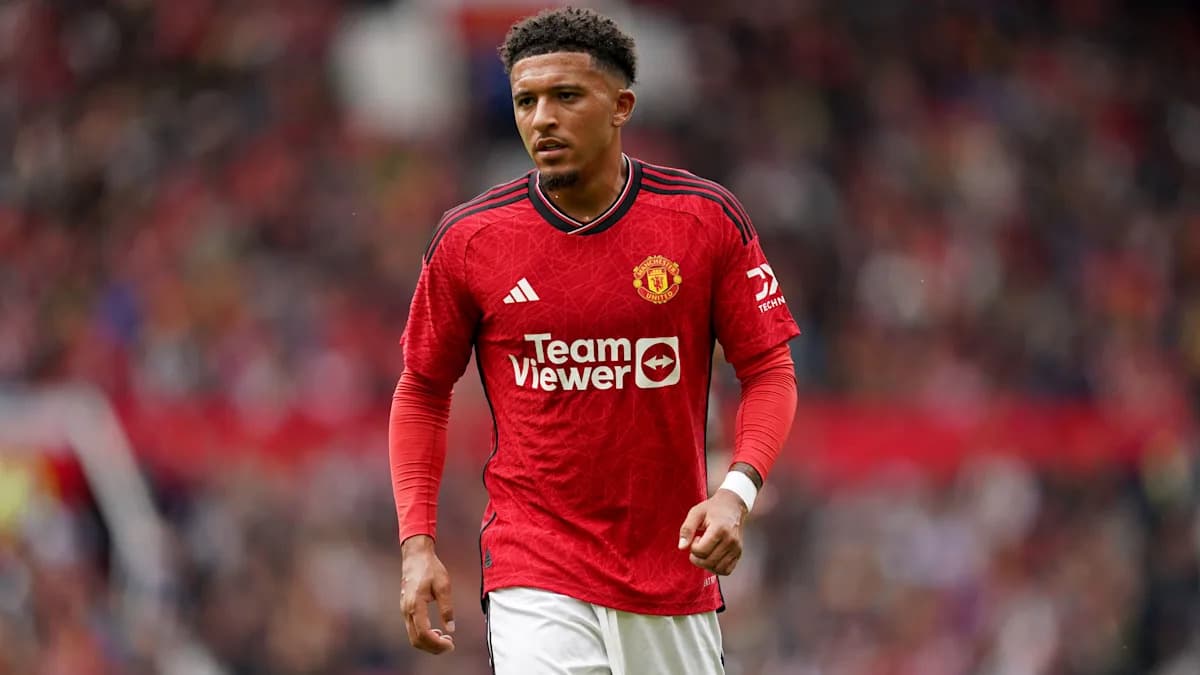 Player in red Manchester United kit on the field