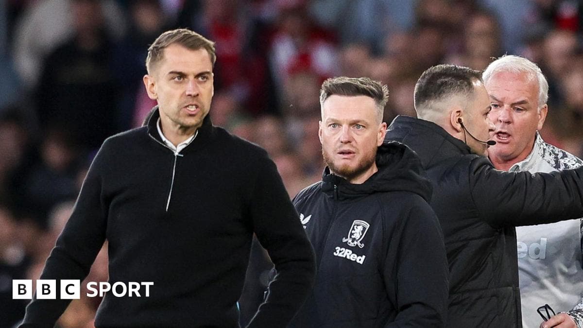 Coaches and staff reacting during match incident