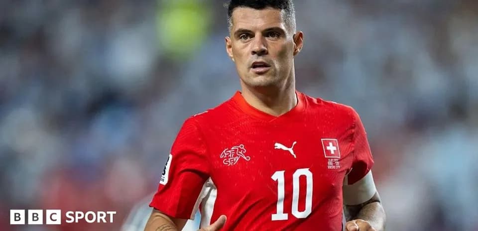 Swiss player in red jersey during match