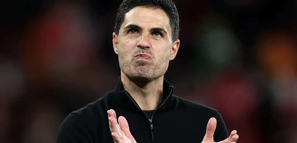 Manager applauding during a match
