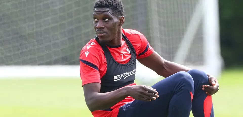 Player sitting during training session on field
