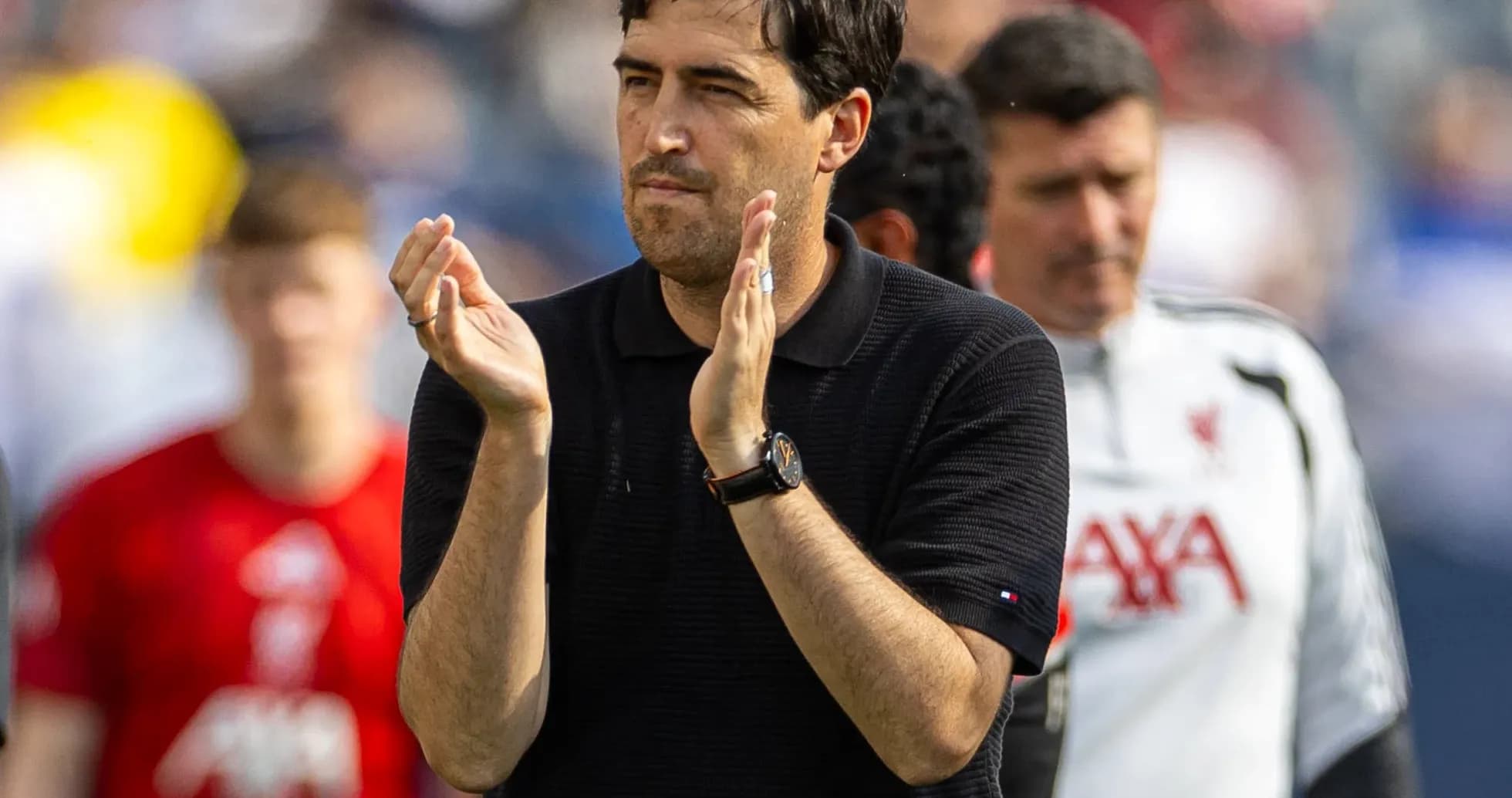 Coach applauding during a match or training session