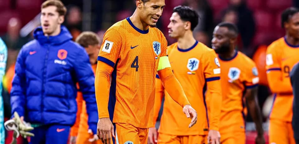 Netherlands players leaving the pitch after match