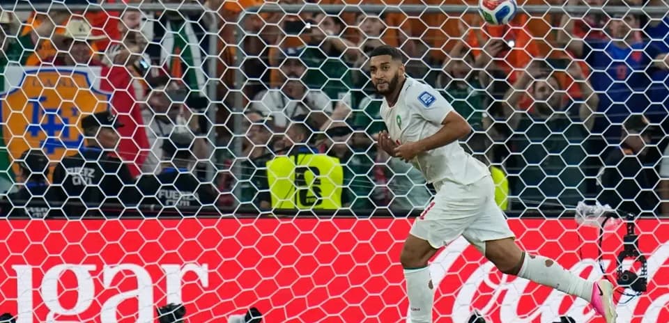Moroccan player celebrating goal against Canada