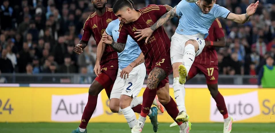 Players contesting for the ball during AS Roma vs Lazio