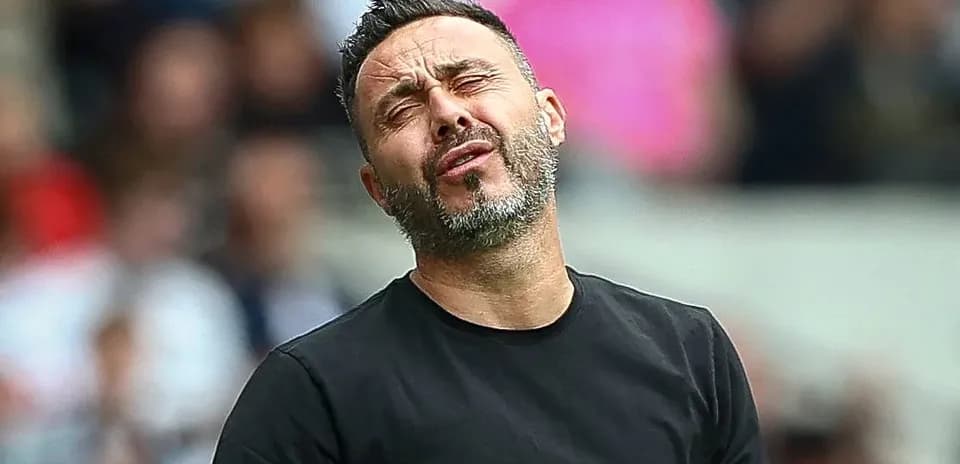 Manager reacting during a match on the sidelines