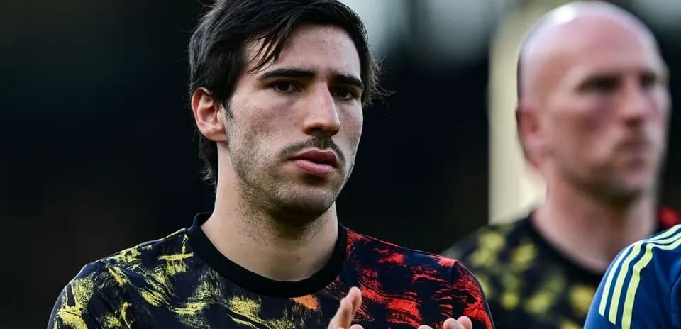 Player in colorful training kit during warm-up