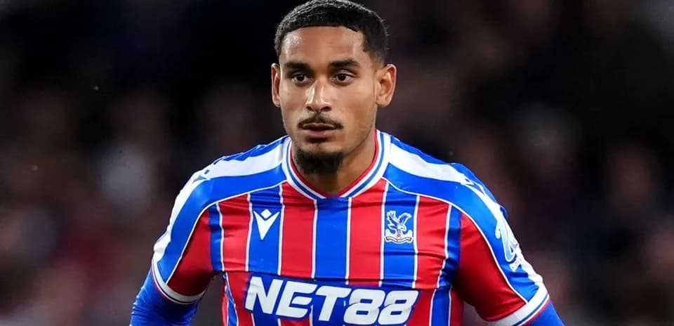 Player in Crystal Palace jersey during match action