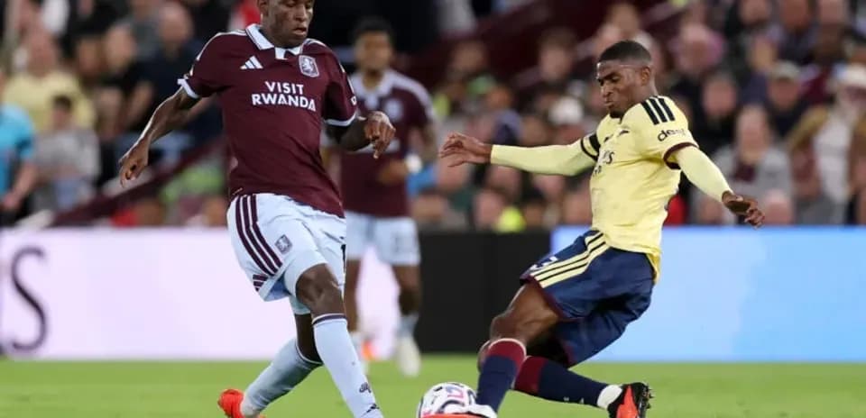 Two players contesting the ball during a match