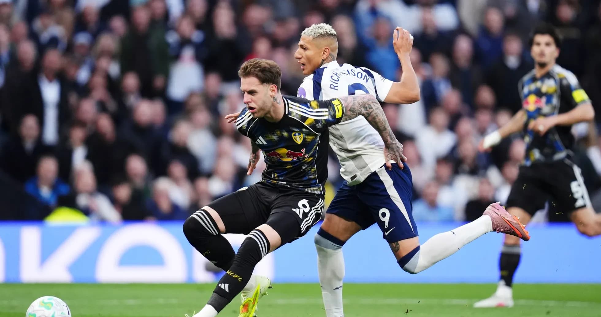 Player tackling during Tottenham vs Leeds match