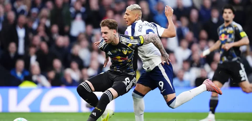 Player tackling during Tottenham vs Leeds match