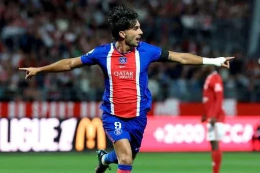 Player celebrating a goal during Ligue 1 match