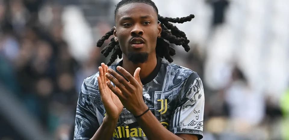 Player applauding fans during match at stadium