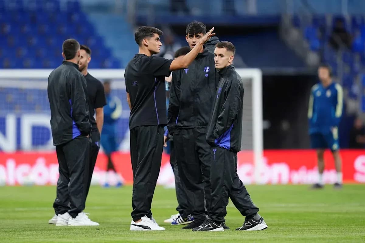 Players discussing on the field during warm-up