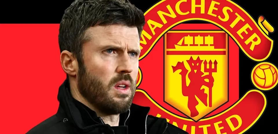 Coach in front of Manchester United logo