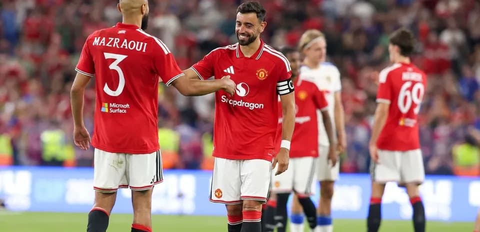Bruno Fernandes and Mazraoui interacting on pitch