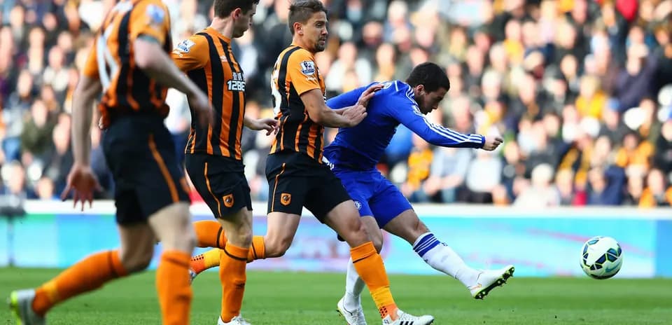 Chelsea player taking a shot against Hull City