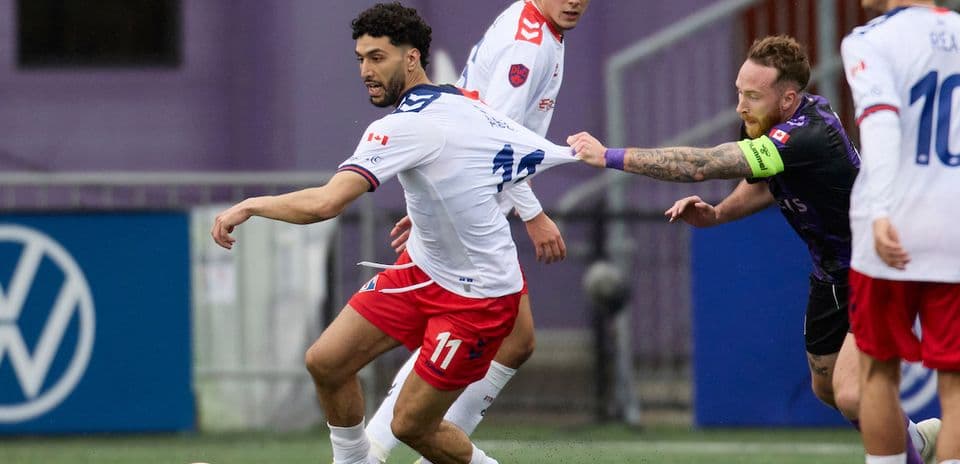 Players competing during Vancouver FC match